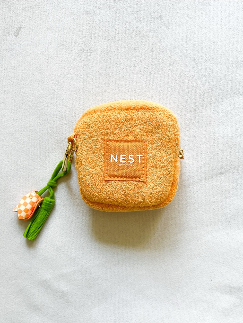 NEST Fragrances Orange Plush Coin Pouch with Green Tassel Charm